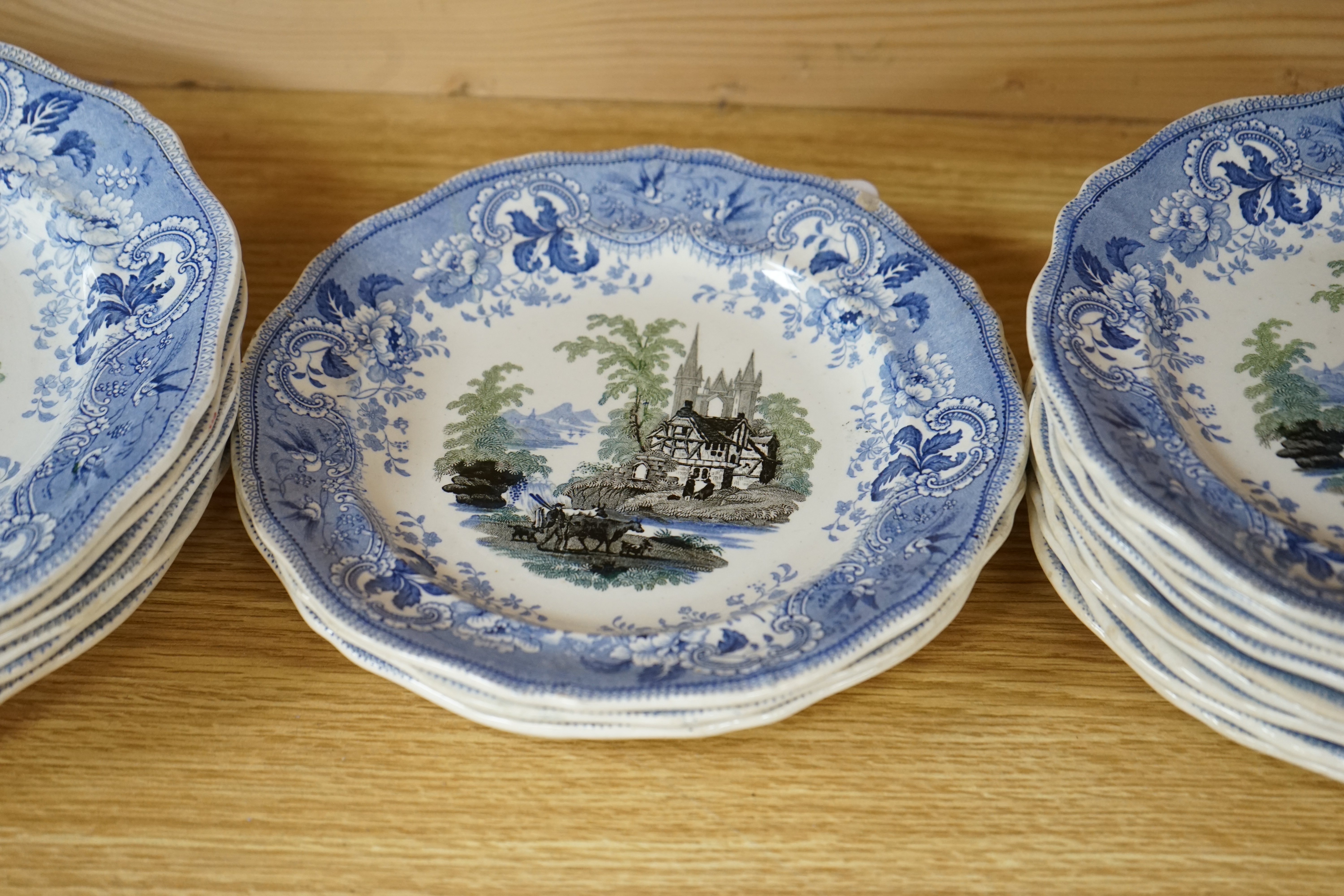 A Davenport part service of eighteen plates, largest 23cm diameter. Condition - fair